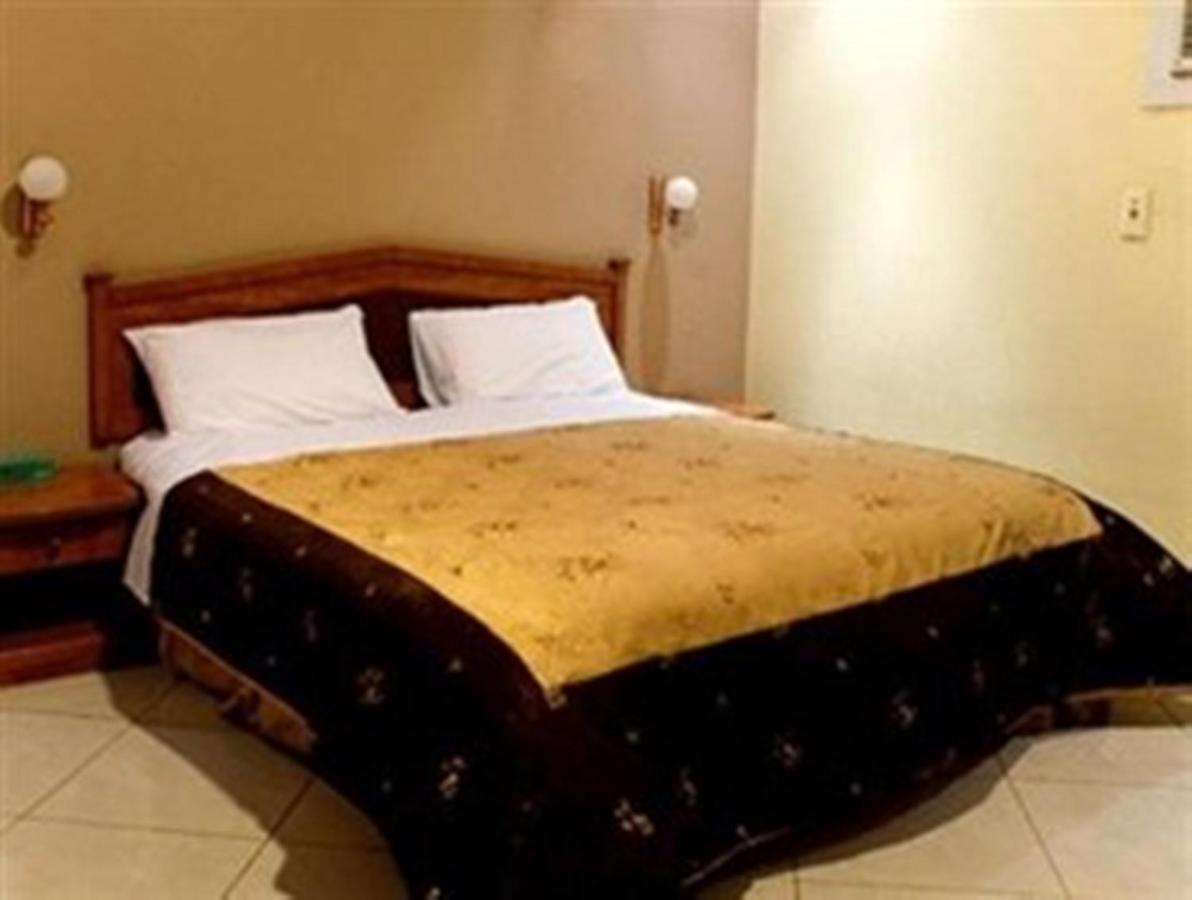 Bait Al Amani Suites Rijád Szoba fotó